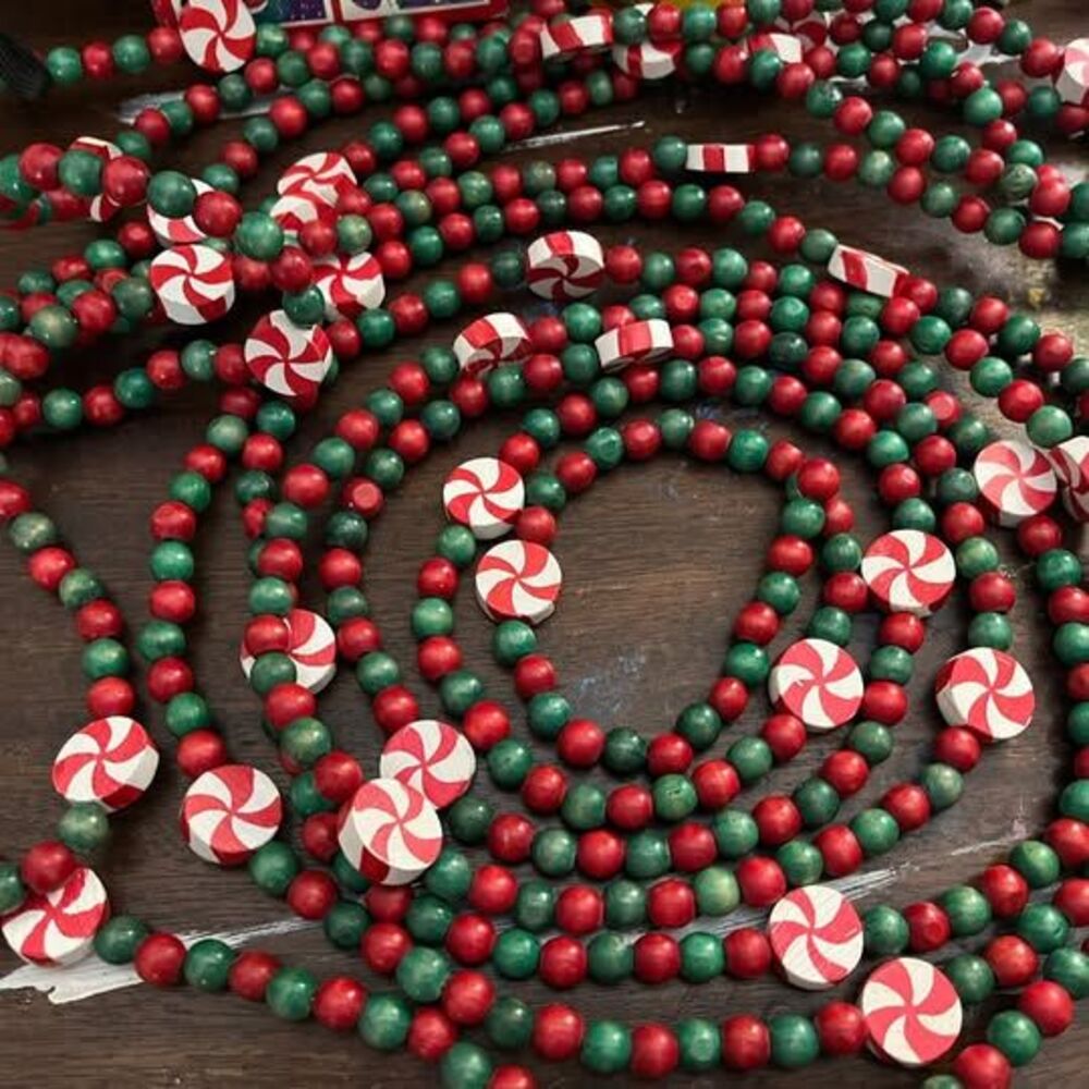 2 Strands of Christmas Peppermint Wood Bead Garland. 11 ft each